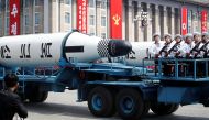 Military vehicles carry missiles with characters reading 'Pukkuksong' during a military parade marking the 105th birth anniversary of country's founding father, Kim Il Sung in Pyongyang, North Korea April 15, 2017. REUTERS/Damir Sagolj