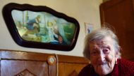 This file photo taken on May 14, 2016 shows Emma Morano, 116, posing for AFP photographer in Verbania, North Italy, on May 14, 2016. Emma Morano was the oldest person in the world, and the only one who has touched three centuries. She died on April 15, 20