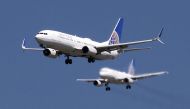 A United Airlines Boeing 737-800 and United Airlines A320 Airbus on seen approach to San Francisco International Airport, San Francisco, California, April 14, 2015. REUTERS/Louis Nastro/File Photo