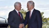 US Vice President Mike Pence (L) shakes hand with Australia's Prime Minister Malcolm Turnbull as they arrive for a joint press conference at the Kirribilli House Sydney on April 22, 2017. AFP / Saeed KHAN

