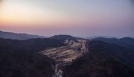 (FILES) This file photo taken on March 18, 2017 shows an aerial view of a golf course used as the site of a recently installed anti Terminal High Altitude Area Defense (THAAD) system in Seongju. Trailers carrying US THAAD missile defence equipment entered