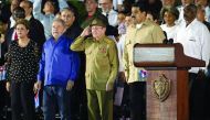 Raul Castro salutes next to Nicolas Mduro during the last ceremony to pay homage to Fidel Castro in Santiago (AFP / JUAN BARRETO) 
