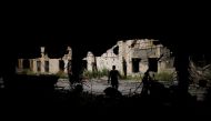 A member of Iraqi forces walks inside Al-Salam hospital destroyed during the fighting between Iraqi forces and Islamic State militants east of Mosul, Iraq May 2, 2017. REUTERS/Suhaib Salem