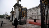 A policeman delivers newspapers to Buckingham Palace in London, Britain May 4, 2017. REUTERS/Toby Melville
