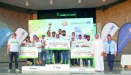 Winners of the AAB Treasure Hunt with their prizes. The event is a CSR initiative promoting public parks in Qatar while reminding the participants to observe road safety practices.