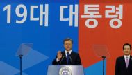 Newly elected South Korean President Moon Jae-in (C) takes an oath during his inauguration ceremony at the National Assembly in Seoul on May 10, 2017. AFP / POOL / Ahn Young-joon