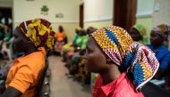 Some of the recently released girls from Chibok wait in Abuja on May 8, 2017. AFP / STEFAN HEUNIS