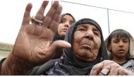 Civilians are seen at a youth center when the clashes between Iraqi soldiers and terrorist organization Daesh continued to retake Iraq's Mosul at Carulla village of Al Makhmour town in Nineveh, Iraq on March 26, 2016. (Hemn Baban - Anadolu Agency ).