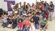 Students and parents with music legends at Music Lounge centre for training in Wakrah. 