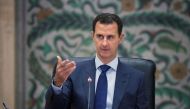 A handout picture released by the official Syrian Arab News Agency on July 11 2016 shows Syrian President Bashar al-Assad during a meeting with members of his government in Damascus 