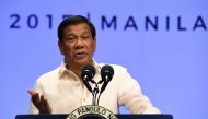 (FILES) This file photo taken on April 29, 2017 shows Philippines' President Rodrigo Duterte gesturing as he speaks during a press conference at the end of Association of Souteast Asian Nations (ASEAN) leaders' summit in Manila. AFP / Ted ALJIBE
