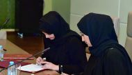 QU Director of Student Development Haya Al Attiya and Best Buddies Qatar Executive Director Laalei Abu Alfain signing the MoU.