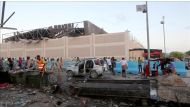 Explosion site after an attack with a bomb-laden vehicle on a restaurant in Mogadishu, Somalia on May 24, 2017. ( Sadak Mohamed - Anadolu Agency ).
