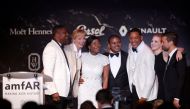 70th Cannes Film Festival - The amfAR's Cinema Against AIDS 2017 event - Auction - Antibes, France. 25/05/2017. Chris Tucker, Uma Thurman, Tobey Maguire, Jury members Jessica Chastain and Will Smith attend an auction. REUTERS/Stephane Mahe