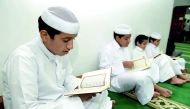 A group of boys reciting the Holy Quran at the Aisha Abdullah Abdul Ghani Masjid in the Old Airport area of Doha yesterday. Pic: Salim Matramkot/ The Peninsula