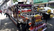 A jeepney adorned with colorful pop culture characters is photographed on a main thoroughfare in Quezon City, metro Manila, Philippines May 29, 2017. REUTERS/Dondi Tawatao 