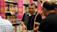 People shop for Ramadan in a mall in Qatar. Pic: Abdul Basit / The Peninsula 