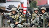 Philippine Marines smile at the media near the stronghold of Maute group in Marawi City in southern Philippines May 30, 2017. REUTERS/Erik De Castro