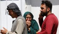 Relatives of Afghan victims mourn outside a hospital after a blast in Kabul, Afghanistan May 31, 2017. REUTERS/Omar Sobhani