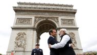 Prime Minister Narendra Modi (R) says goodbye to French President Emmanuel Macron after a ceremeny at the Arc de Triomphe on the last leg of his four-nation visit in Paris, France, June 3, 2017. (REUTERS/Charles Platiau)