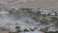 Smoke rises from the site of a suicide attack after a blast in Kabul