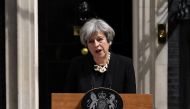 Britain's Prime Minister Theresa May delivers a statement outside 10 Downing Street in central London on June 4, 2017, following the June 3 terror attack. AFP / Justin TALLIS