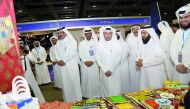 Minister of Administrative Development, Labour and Social Affairs H E Dr Issa bin Saad Al Jafali Al Nuaimi after inaugurating a charity bazaar at QNCC.