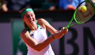 Jelena Ostapenko of Latvia in action against Timea Bacsinszky of Switzerland during their semi final match of the French Open tennis tournament at the Roland Garros stadium in Paris, France on June 08, 2017. (Mustafa Yalç?n - Anadolu Agency)