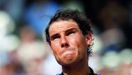 Spain's Rafael Nadal reacts after winning the French Open final - his 10th title - against Switzerland's Stan Wawrinka in Paris on Sunday.