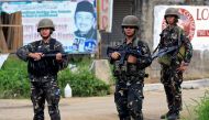 Government soldiers stand on guard as government troops continue their assault against insurgents from the Maute group, who have taken over large parts of Marawi city, Philippines June 15, 2017. REUTERS/Romeo Ranoco