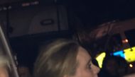Singer Adele is pictured near the Grenfell Tower apartment block at Latimer Road in West London, Britain June 15, 2017, in this picture obtained from social media. TWITTER: FOURMEE via REUTERS 