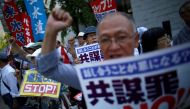  Protesters shout slogans as they protest against an anti-conspiracy bill outside parliament building in Tokyo. Photograph: Issei Kato/Reuters.