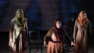 Kamala Sankaram (C) portrays Pakistani women's rights activist Mukhtar Mai in the opera 'Thumbprint' at the Roy and Edna Disney/Calarts Theater (REDCAT) in Los Angeles, California, June 16, 2017. AFP / Robyn Beck 
