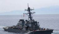 This picture shows the guided missile destroyer USS Fitzgerald off the Shimoda coast after it collided with a Philippine-flagged container ship on June 17, 2017. Japan OUT / AFP / JIJI PRESS / STR