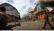 Smoke rises as government troops conduct an operation against Maute rebels in Marawi City in Southern Philippines on June 6, 2017. ( Richard Atrero de Guzman - Anadolu Agency ).