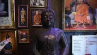 This photo taken on June 13, 2017 shows a Buddha wrought from recycled metal at Ban Hun Lek, a metal works shop renowned for giant statues of Transformers, the Hulk and other pop icons, in the central Thai province of Angthong. AFP / LILLIAN SUWANRUMPHA