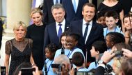 PARIS, FRANCE - JUNE 21: French President Emmanuel Macron (R), his wife Brigitte Macron (L), Colombian President Juan Manuel Santos (2nd R) and his wife Maria Clemencia Rodriguez (2nd L) pose as they arrived at the Elysee Palace in Paris, France on June 2
