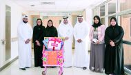 Officials from Ooredoo Group of companies visit children at Hamad Hospital as part of their activities to share the spirit of Ramadan, yesterday. 