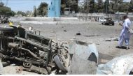 QUETTA, PAKISTAN - JUNE 23 : A wreckage of a car is seen as a Pakistani Security official inspects at the site of suicide bomb blast in Quetta, Pakistan on June 23, 2017. At least 12 people were killed and 16 injured in a suicide attack near the office of