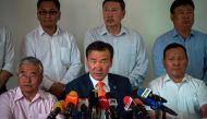 Presidential candidate Sainkhuu Ganbaatar (C), from the Mongolian People?s Revolutionary Party (MPRP) speaks during a press conference at his headquarters in Ulan Bator on June 27, 2017. AFP / FRED DUFOUR