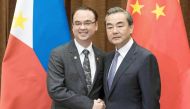 Chinese Foreign Minister Wang Yi (right) meets Philippine Department of Foreign Affairs (DFA) Secretary Alan Peter Cayetano during a meeting at the Ministry of Foreign Affairs in Beijing, yesterday.
