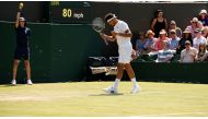  Flying ants surround France’s Jo-Wilfried Tsonga during his second round match against Italy’s Simone Bolelli (REUTERS/Andrew Couldridge)