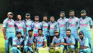 Galfar Cricket Club team with the trophy. 