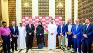 Officials, of MOTC and Vodafone Qatar, during the MoU signing ceremony. 