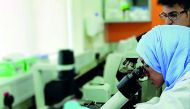 A researcher of the HBKU at work.