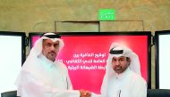 Katara General Manager, Dr Khalid bin Ibrahim Al Sulaiti (right), and the Co-Founder of Al Shabhana Association, Abdullah Khalid AlKhater, at the signing event.