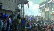 Kashmiri youths clashing with government forces during the funeral of Tanveer Ahmed in Beerwah, yesterday.