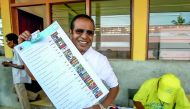 Former East Timor president Taur Matan Ruak shows the ballot paper during parliamentary election, in Dili, yesterday.