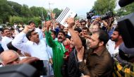 Opponents of Pakistan's Prime Minister Nawaz Sharif shout slogans after the Supreme Court's decision to disqualify Sharif, in Islamabad, Pakistan July 28, 2017. (REUTERS/Faisal Mahmood)