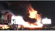 Smoke is seen rising from flames engulfing the stage after a fire broke out at Tomorrowland Unite Spain festival in Barcelona, Spain July 29, 2017, in this still image from a video obtained from social media. Alex Prim Lopez via REUTERS 